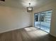 Bright dining area with sliding glass doors leading to a lanai at 3813 42Nd W St # 37, Bradenton, FL 34205