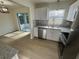 Bright kitchen with stainless steel appliances and granite countertops at 3813 42Nd W St # 37, Bradenton, FL 34205