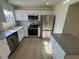 Modern kitchen featuring stainless steel appliances and granite countertops at 3813 42Nd W St # 37, Bradenton, FL 34205