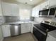 Modern kitchen featuring stainless steel appliances and granite countertops at 3813 42Nd W St # 37, Bradenton, FL 34205