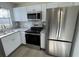 Stainless steel appliances and granite countertops in this updated kitchen at 3813 42Nd W St # 37, Bradenton, FL 34205