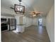 Open living area with hardwood floors and ceiling fan at 3813 42Nd W St # 37, Bradenton, FL 34205