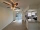 Open concept living area with a view into updated kitchen at 3813 42Nd W St # 37, Bradenton, FL 34205