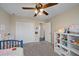 Spacious bedroom with double door closet and ceiling fan at 509 Powder View Dr, Ruskin, FL 33570