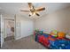 Cozy bedroom with double door closet and ceiling fan at 509 Powder View Dr, Ruskin, FL 33570