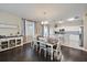 Dining room with table and chairs and a view into the kitchen at 509 Powder View Dr, Ruskin, FL 33570