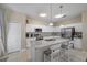 Kitchen with white cabinets, granite countertops and stainless steel appliances at 509 Powder View Dr, Ruskin, FL 33570