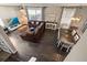 Open living room and dining area with dark hardwood floors at 509 Powder View Dr, Ruskin, FL 33570