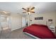 Spacious main bedroom with a king-size bed and en-suite bathroom at 509 Powder View Dr, Ruskin, FL 33570