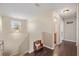 Upstairs hallway with hardwood floors and access to bathroom at 509 Powder View Dr, Ruskin, FL 33570