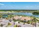 Aerial view of community amenities including pool and tennis at 5406 Morey Farms Loop, Palmetto, FL 34221
