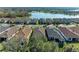Aerial view of community homes near a lake at 5406 Morey Farms Loop, Palmetto, FL 34221
