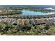 Aerial view of luxury homes, lake, and landscape at 5406 Morey Farms Loop, Palmetto, FL 34221
