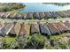 Aerial perspective of multiple homes with lake access at 5406 Morey Farms Loop, Palmetto, FL 34221