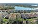 Aerial view of upscale homes, community lake, and lush landscaping at 5406 Morey Farms Loop, Palmetto, FL 34221