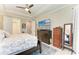 King-size bed, dresser, and access to the bathroom at 5406 Morey Farms Loop, Palmetto, FL 34221