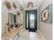Bright foyer with decorative wall art and console table at 5406 Morey Farms Loop, Palmetto, FL 34221