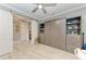 Hallway with built-in wall unit and access to other rooms at 5406 Morey Farms Loop, Palmetto, FL 34221