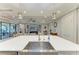 Island kitchen features a large sink and white quartz countertops at 5406 Morey Farms Loop, Palmetto, FL 34221