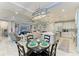 Open kitchen with breakfast nook, island and living room view at 5406 Morey Farms Loop, Palmetto, FL 34221