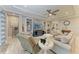 Spacious living room with comfortable seating and built-in shelving at 5406 Morey Farms Loop, Palmetto, FL 34221