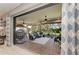 Relaxing screened porch with wicker furniture and view at 5406 Morey Farms Loop, Palmetto, FL 34221