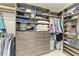 Large walk-in closet with ample shelving and hanging space at 5406 Morey Farms Loop, Palmetto, FL 34221