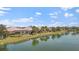 Lakefront community view with lush landscape at 5521 Bilbao Pl, Sarasota, FL 34238