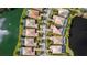 Bird's-eye view of lakefront homes and community at 5521 Bilbao Pl, Sarasota, FL 34238