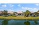 Houses with screened patios along the lake at 5521 Bilbao Pl, Sarasota, FL 34238
