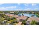 Community overview with lakefront homes at 5521 Bilbao Pl, Sarasota, FL 34238