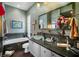 Elegant bathroom with a soaking tub and double vanity at 5521 Bilbao Pl, Sarasota, FL 34238