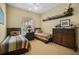 Cozy bedroom with twin beds and ample closet space at 5521 Bilbao Pl, Sarasota, FL 34238