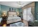 Spacious bedroom with king-size bed and water view at 5521 Bilbao Pl, Sarasota, FL 34238