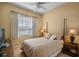 Spacious bedroom with a comfortable bed and nightstands at 5521 Bilbao Pl, Sarasota, FL 34238