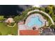 Relaxing freeform pool with ample lounge chairs at 5521 Bilbao Pl, Sarasota, FL 34238