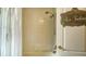 Simple bathroom with shower/tub combo and white tile at 6425 Stone River Rd, Bradenton, FL 34203