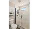 Bathroom features a glass shower enclosure with black hardware and white subway tile at 7254 Cedar Hollow Cir, Bradenton, FL 34203