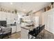 Modern kitchen with stainless steel appliances, a breakfast bar, and ample counter space at 7254 Cedar Hollow Cir, Bradenton, FL 34203