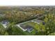 Aerial view of two houses nestled in a lush green neighborhood at 80 Albritton St, Port Charlotte, FL 33953