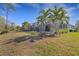 View of the backyard pool and screened enclosure at 8018 Sandstar Way, Sarasota, FL 34240