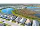 Aerial view showing home's location near a lake at 8066 Redonda Loop, Bradenton, FL 34202