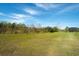 Green grassy backyard with preserve views at 8066 Redonda Loop, Bradenton, FL 34202