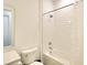 White subway tile bath with shower and built-in tub at 8066 Redonda Loop, Bradenton, FL 34202