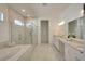 Spa-like Primary bathroom with soaking tub and walk-in shower at 8066 Redonda Loop, Bradenton, FL 34202