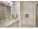 Clean bathroom with gray vanity, quartz countertop, and shower at 8066 Redonda Loop, Bradenton, FL 34202