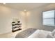 Well-lit bedroom featuring a cozy bed and minimalist decor at 8066 Redonda Loop, Bradenton, FL 34202