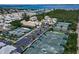Community overview showcasing tennis courts and waterfront at 821 Evergreen Way, Longboat Key, FL 34228