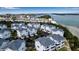 Aerial perspective of a coastal community near the water at 821 Evergreen Way, Longboat Key, FL 34228