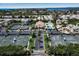 Aerial view of community with pool and tennis courts at 821 Evergreen Way, Longboat Key, FL 34228